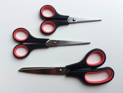 Scissors with plastic handle